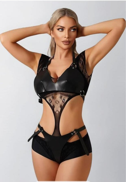 My Store 3 NYVRA Ravishing Noir one-piece swimsuit displayed on a model, featuring a sleek black design and stylish fit.